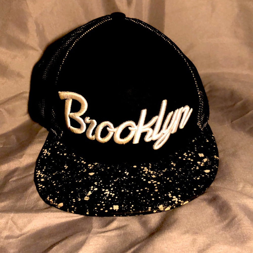 A flat rim snap back hat